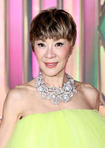 Michelle Yeoh appears at the Wicked For Good premiere in a pixie cut with golden highlights.